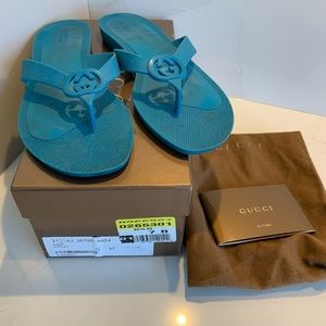 Authentic Gucci blue rubber flip flops